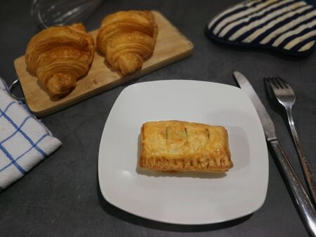 Croissant and Chicken Pie with black coffee