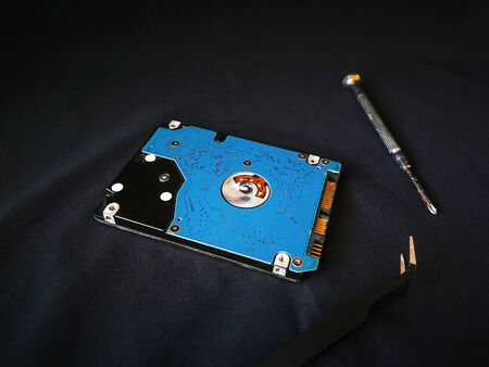 The concept of computer hardware upgrade and technology. Repairing and upgrade SSD (Solid State...