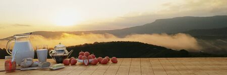 Panorama Breakfast fresh milk  Coffee in a glass and a coffee pot. Butter bread on a wooden chopping board. Many fresh strawberries. Mountain in the morning with mist and The sun shines. 3D renderingの写真素材