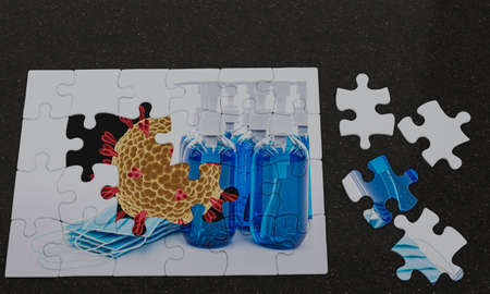 jigsaw picture overlap, the background is a Coronal Covid-19 virus and the picture above is a puzzle...