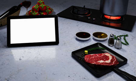 Learn to cook online. How to cook food and recipes from the internet. Meat for cooking steak on the pan. There is butter and pepper. Computer or tablet for studying online in the kitchen. 3D Renderingの写真素材