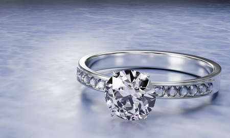 The large diamond is surrounded by many diamonds on the ring made of platinum gold placed on a gray...