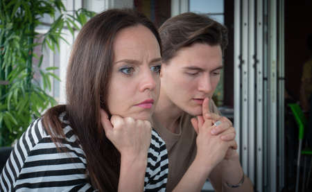 Depression concept, care and treatment. Young woman, Caucasian, white skin, rutted face, worried,...