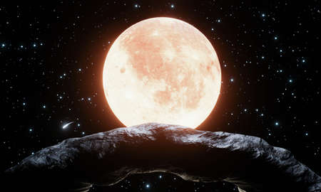 Round-shaped rock formations on the mountain There is a background Full moon red or orange with...