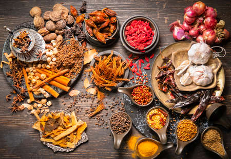 Top view Herbs for cooking, such as red curry, stewed or tom yum soup, such as shallots, garlic,...