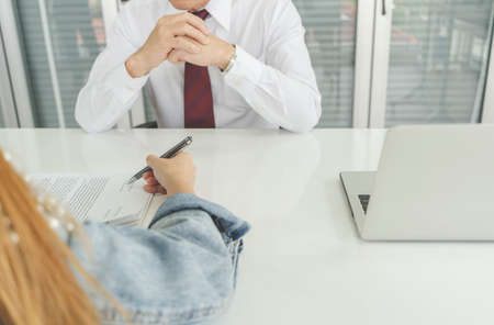 image of hand do gestures signing a contract on document for building house economic or insurance...