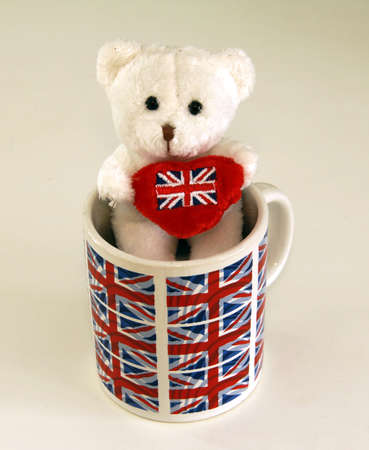 little white bear hold red heartの写真素材