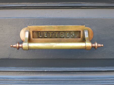 Old Letterbox in Wooden Doorの写真素材