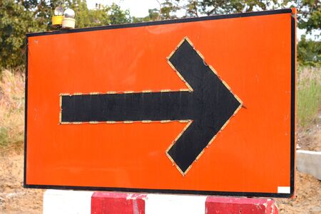 Sign direction near the roadの写真素材