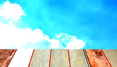 Blue sky and wood background conceptの写真素材