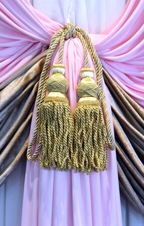 Braided rope on the draperyの写真素材