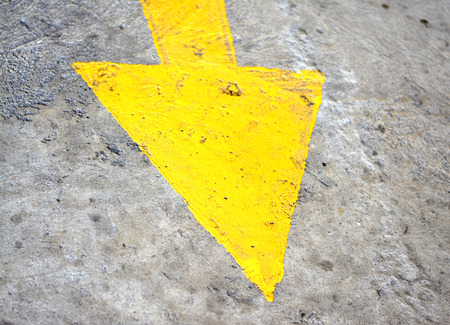 Arrowhead yellow color on the road