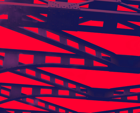 Metal abstracts of bridges on red color backgroundの写真素材