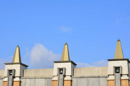 Three towers of light side the road on blue clear sky and cloud backgroundの写真素材