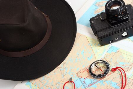 Hat, camera, compass and mapの写真素材