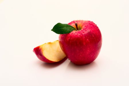 Red apple with warter drop on white backgroundの写真素材