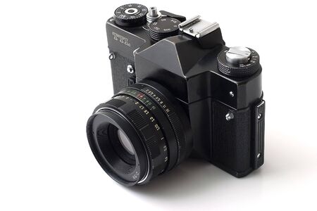 Old film camera isolate on a white background