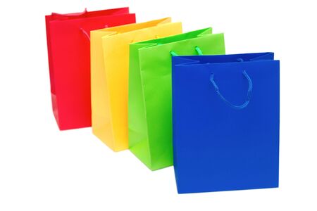 Multi-coloured packages for purchases are isolated on a white background.の写真素材