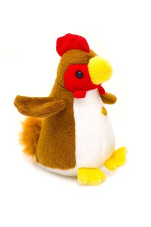 A colorful toy rooster on a white backgroundの写真素材
