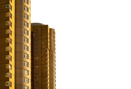 Two high-rise apartment houses. Sunset illumination. A background for the information on the real estate and housing construction.の写真素材