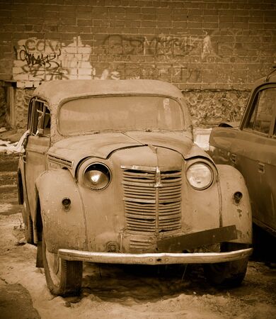 Rusty old car in sepia outdoorsのeditorial素材