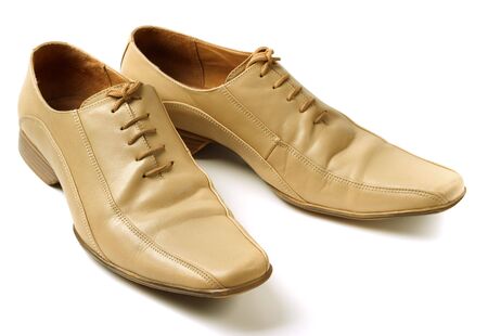 Mans beige shoes. Isolated on a white backgroundの写真素材