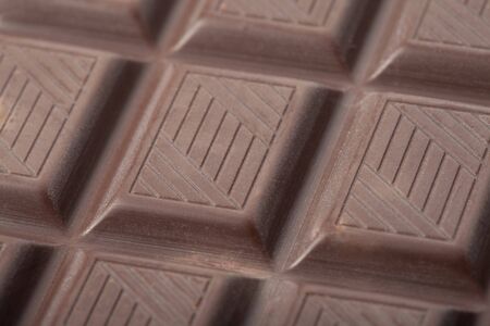 Bar of milk chocolate closeup. Soft, rich, delicate brown color reserved. Sharpness was not increased.の写真素材