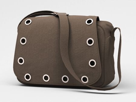 Women's grey handbag with studs on light backgroundの写真素材