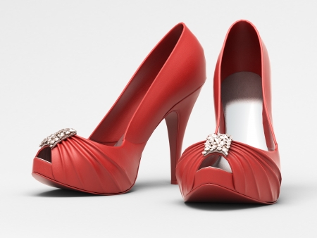 Women's red shoes closeup on a light backgroundの写真素材
