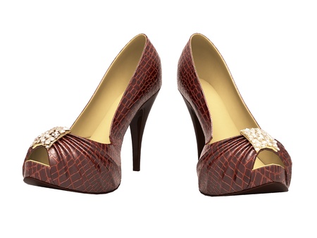 Crocodile leather women's shoes with high heels close up on a light backgroundの写真素材