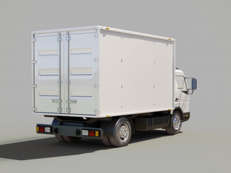 White commercial delivery truck on gray backgroundの写真素材