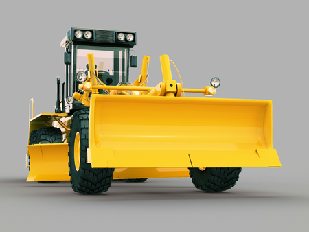 Modern three-axle road grader on a gray backgroundの写真素材