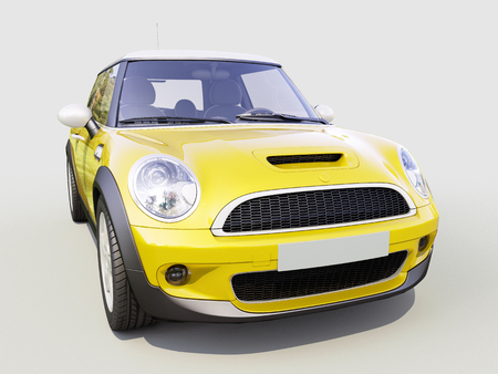Modern compact city car on a gray backgroundの写真素材