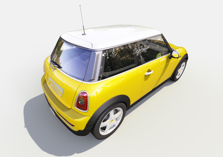 Modern compact city car on a gray backgroundの写真素材