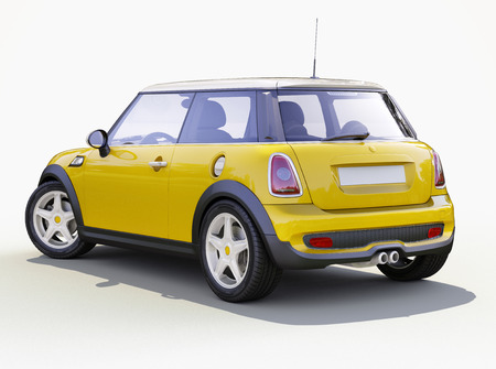 Modern compact city car on a gray backgroundの写真素材