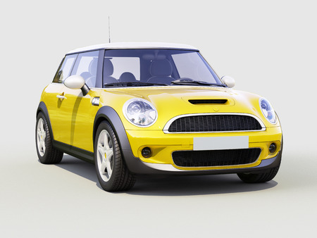 Modern compact city car on a gray backgroundの写真素材