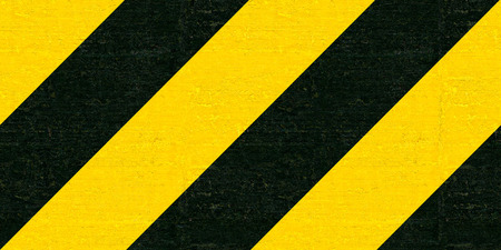 Warning black and yellow hazard stripes texture. Construction signの写真素材