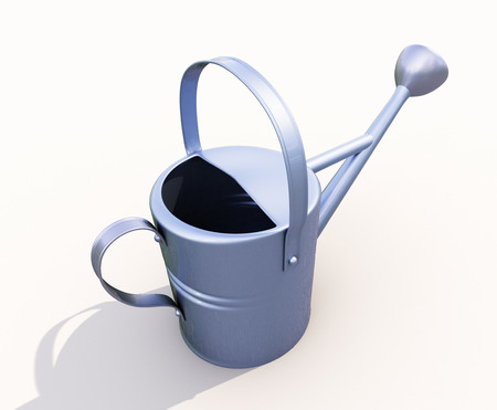 Watering can made of metal on white backgroundの写真素材