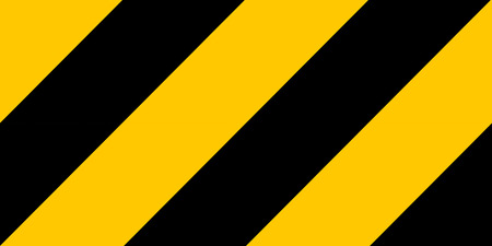 Warning black and yellow hazard stripes texture. Construction signの写真素材
