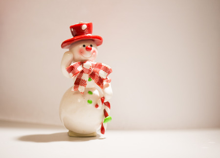 Christmas or New Year's greeting card with a snowmanの写真素材