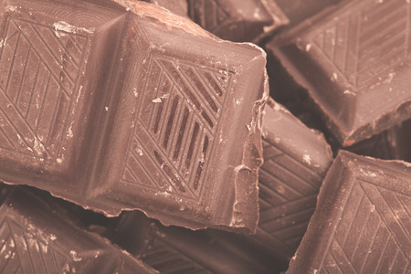 Pieces of milk chocolate closeup. Macro photoの写真素材