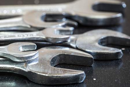 Set of the stainless steel wrench on dark backgroundの写真素材