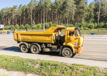 RUSSIA, YEKATERINBURG - AUGUST 19, 2016: A common Russian Kamaz dump truck at workのeditorial素材