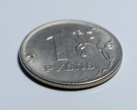 Obverse of Coin one Russian Ruble, New Russian Coin - One Rouble, Russian Ruble on the Coin Background, Shiny Silver Coin of One Ruble (Rouble) as a Symbol of Russian Currencyの写真素材