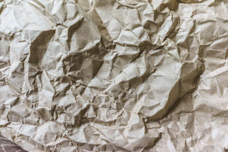 Abstract Old Crumpled Brown Paper Texture, Brown Wrinkle Recycle Paper Background, Creased Beige Paper Texture, Rough Texture Background of Brown Paperの写真素材