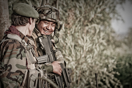 Kabul, Afghanistan - March 11, 2011. Legionnaires of the French foreign legion with weapons during the military operation in Afghanistan.のeditorial素材