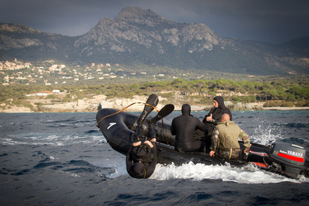 Calvi, Corsica - September 13, 2011. A group of legionnaires-amphibians of the 1st engineering regiment of the French foreign legion immersed in water.のeditorial素材