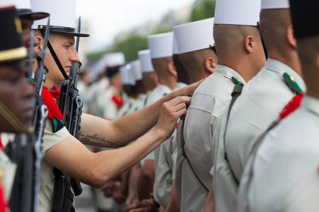 France, Paris - 14 july 2011.Legionnaires of the French foreign legion in parade uniform carry out the last preparations before the parade on the Champs Elyseesのeditorial素材