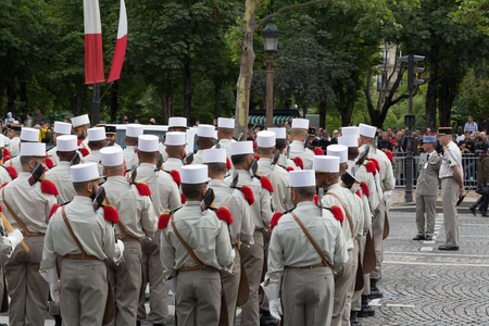 Paris, France - July 14, 2012. Soldiers from the French Foreign Legion march during the annual military parade in honor of the Bastille Day in Paris.のeditorial素材