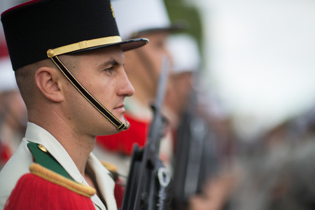Paris, France - July 14, 2012. Soldiers from the French Foreign Legion march during the annual military parade in honor of the Bastille Day in Paris.のeditorial素材